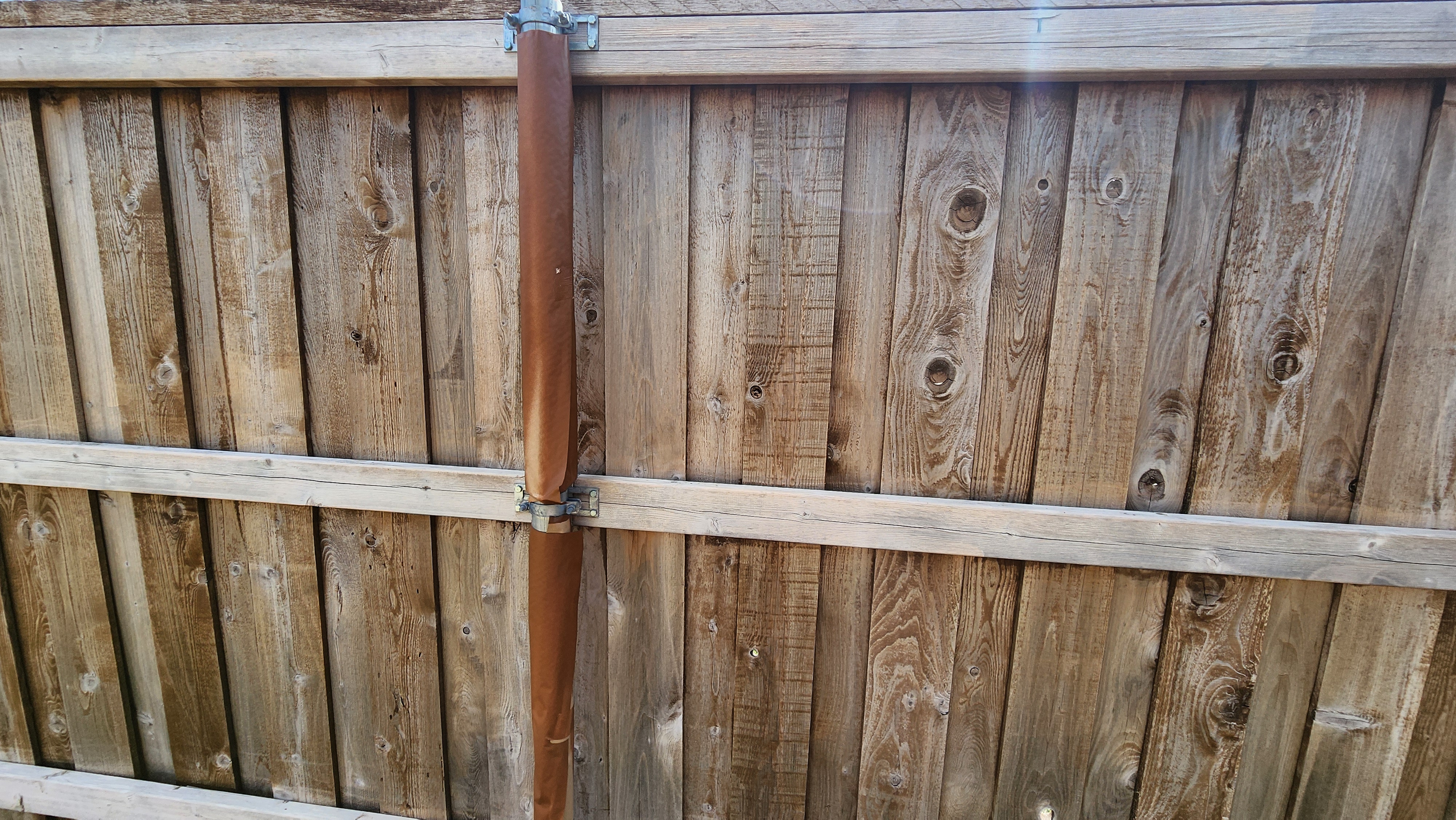3.5 years old fence showing bare wood